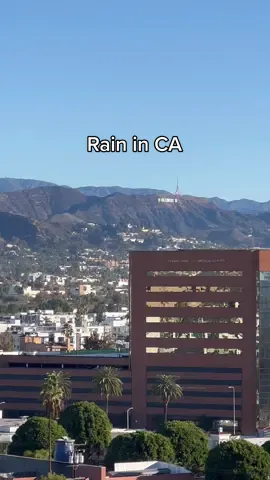 My favorite part is seeing the snow cap mountains tho🤌🏼🗻 #losangeles #losangelesrain #rainy #rainyweather #fallweather #california #mountains #views #rooftop #hollywood #hollywoodsign #tourism 