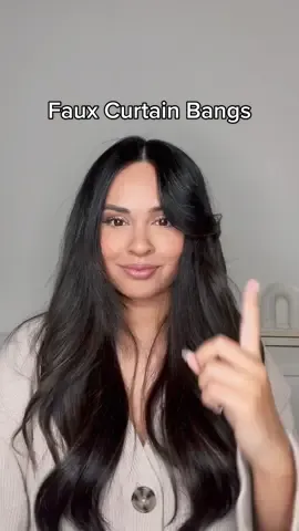 Want curtain bangs without the commitment? Try this curling hack  I start the curl at the very top, then I push my bangs forward on my forehead and create a swoop. Add a clip around the eye area to see in place and let it sit for a few mins. Lmk if you will try!  #hairstyles #curtainbangs #bangs #hairtutorial #hairinspo 