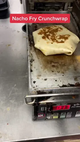 Who would try this #nachofry #crunchwrap #tacobell 