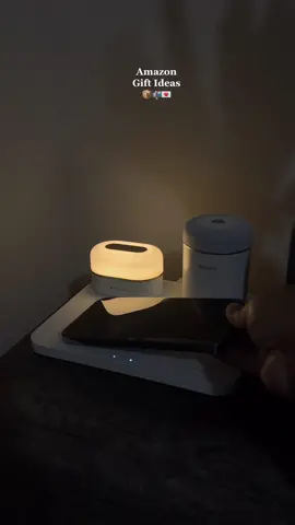 The most aesthetically pleasing charging station. It comes with a light, a bluetooth speaker and you can just lay your phone to charge at night. 100% recommend this! Perfect gift for the Holidays! 🫶🏼🎄 LINK IN BIO under LTK! 🤍 #chargingstation #giftideas #christmasgiftideas #christmasgifts #amazonfinds #amazongiftideas #amazongiftguide #amazonmusthaves #amazonfavorites #amazongiftsforher #foryou #fyp 