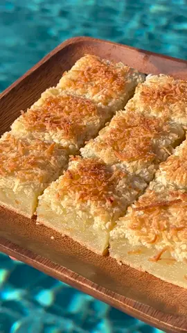 TOASTED COCONUT BUTTER MOCHI  Recipe:  6 tbsp unsalted butter  1 box mochiko sweet rice flour  2 tsp baking soda 1/2 tsp salt 4 large eggs 2 cups granulated sugar 2 (13.5oz) cans unsweetened, full fat coconut milk 1 tbsp vanilla extract 1 tbsp coconut extract (optional)  1/2 cup sweetened shredded coconut #fyp #baking #bakingrecipe #bakingrecipes #EasyRecipe #EasyRecipes #butter #coconut #mochi #maui #islandlife #hawaii 
