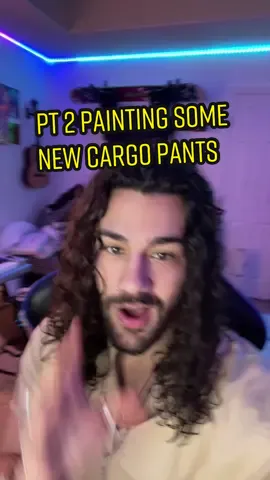 Should I add more? Is it finished ? I kinda like it as is but maybe adding text on the right leg over the yellow on the cuff? I’m going to go live and paint a shirt too so if you wanna join me in time you might see me add on to the pants or just do a new piece! #custompants #clothingbrandstartup #artistsoftiktok #paintingonpants #oneofone #cargopants #whereisup #handpaintedclothing 