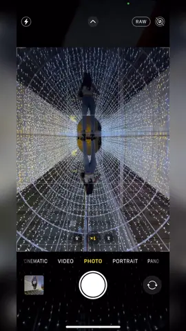 Creative photo idea 💡📸 Adding leading lines can really make your pictures stand out. In this example, I found a tunnel of lights, you can use a bridge or a nice ceiling. To make your photo pop even more, grab a second phone to add a reflection of the lines!! Model: @alyssabellet  💃 Location: @glow_toronto 📍 #Photography #learnphotography #phototips #phototricks #photographyschool #iphonephoto #toronto #canada #ontario #glowtoronto 