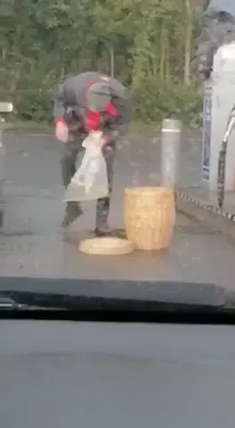 Man filling a trash bag with petrol and placing it in a basket in the boot of his car  #dashcamlessons #idiotsincars #baddrivers #usa #2022 