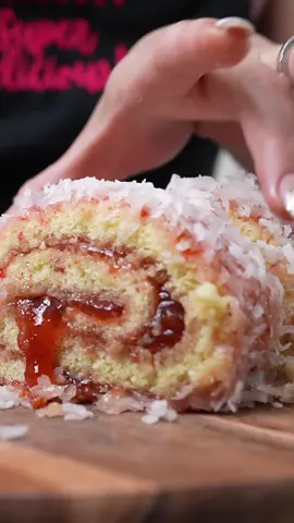 The BEST Mexican Pan Dulce, NIÑO ENVUELTO, Cake Under 15 MINUTES | MEXICAN JELLY ROLL CAKE this is a childhood favorite, now I make it at home and it’s just seriously the BEST, the best part it doesn’t taste soooo much like egg 😅🤭  surprise everyone this Christ as with such a beautiful and delicious cake ☺️❤️  I M P O R T A N T ⚠️  Make sure not to over bake the cake!  Tip!!! WORK QUICK BETWEEN ROLLING AND ADDING THE JAM, ALSO MAKE SURE YOU THIGHT ROLL THE CAKE! Tip 2** USE THE STRAWBERRY TOPPING INSTEAD OF JAM Tip 3** SPREAD A THIN LAYER OF STRAWBERRY INSIDE CAKE You MUST use a 15X10X1 baking sheet Ingredients: 8 servings 3 eggs at room temperature 1/2 cup sugar 2 tsp vanilla extract 2 tbsp vegetable oil 2 tbsp milk  1 cup all purpose flour 1 tsp baking powder 1/2 tsp baking soda Pinch of salt 11.7 oz strawberry jam or topping Coconut flakes 1 serving of love 💕  #cakeroll #niñoenvuelto #jellycake #mexican #pandulce #homemade #sweetbread #GenshinImpact33 #fyp #recetasfaciles #howto #bake #cake 