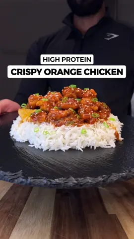 High Protein Crispy & Sticky Orange Chicken! All for 336 Calories with 47g of protein! A popular takeout meal made healthier, with lower calories and better macros! You can still enjoy your favourite foods for weight loss! Macros per serving without rice 336 calories - 47g protein / 24g carbs / 6g fat Macros per serving with 120g cooked rice 455 calories - 48g protein / 57g carbs / 6g fat INGREDIENTS (for 2 servings) For the Crispy Chicken: • 300g raw chicken breast (cut into cubes) • 1 tsp salt & pepper • 1 tsp garlic powder • 1 tsp paprika or smoked paprika • 25g cornflour or cornstarch • 1 tsp baking powder For the Sticky Orange Sauce: • 150ml fresh orange juice (you can squeeze from fresh oranges) • 25 ml low sodium soy sauce • 15g honey • 5g cornflour or cornstarch • 40-50ml water • 1/2 tsp chilli flakes • 3 garlic cloves chopped • 1 tbsp ginger chopped • Orange zest (optional) For Garnish: • Sesame seeds • Green onion / Scallion To serve: • 120g cooked white rice per serving Calories and macros may vary based on ingredients you use! ENJOY! Can’t wait for you to try this! Find more Easy, Healthy & Delicious Recipes like this in My Cookbook! #orangechicken #chinesefood #asianfood #healthyrecipes #lowcalorie #highprotein #Foodie #takeout #takeaway #pandaexpress #mealprep #EasyRecipes 