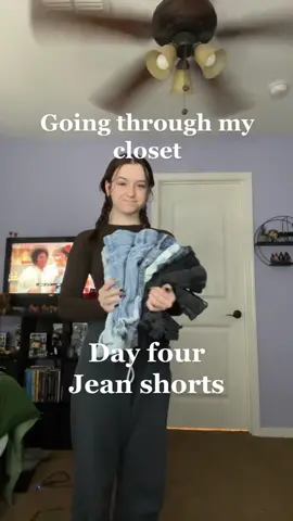 Replying to @brown_eyezz43 going through my closet day four #organizing #clothes #jeanshorts #closetpurge 