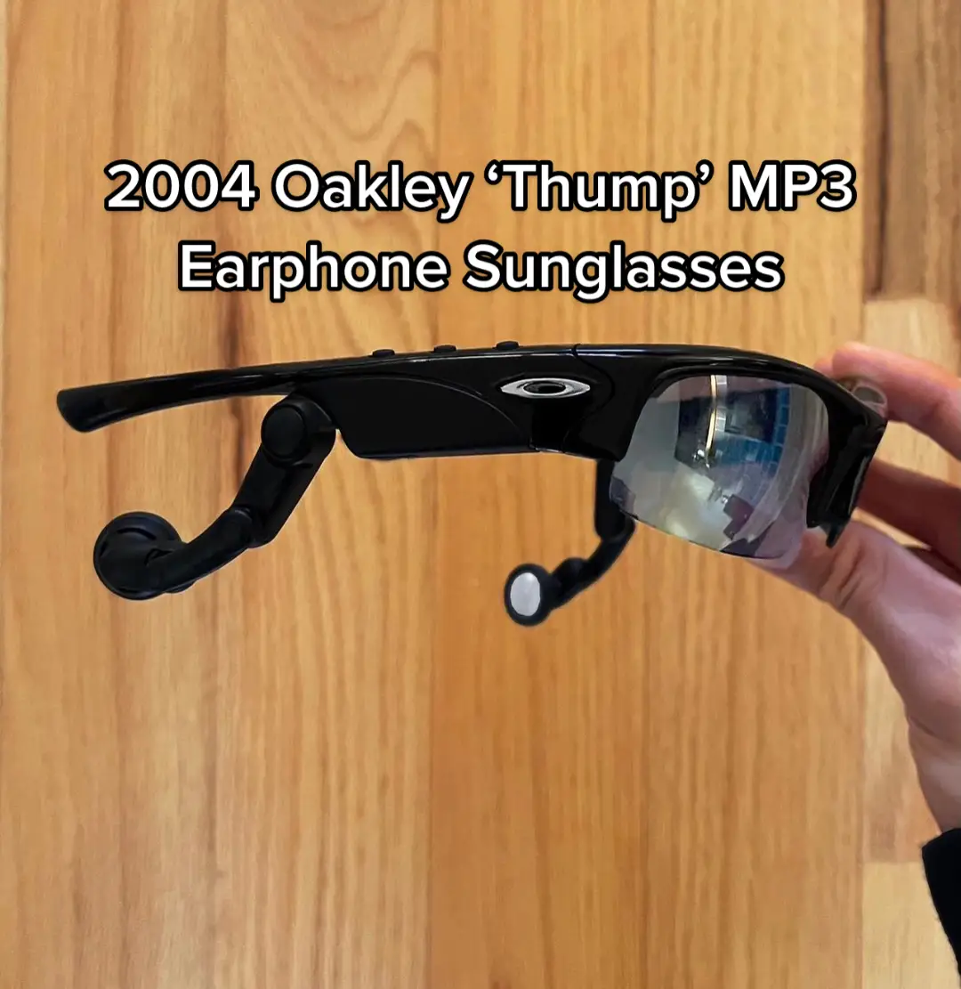 (FOR SALE) A pair 2004 Oakley “Thump” MP3 headphone performance sunglasses.   Oakley’s recent resurface to the top of the tank is one of the most prominent and long-standing trends we’ve seen out of the 2000’s resurgence. With futuristic and technical shapes, Oakley’s innovation in eyewear has become the pinnacle of sporting outrageous accessories in recent months. Since seeing the “Thump” on the New York Yankee’s right fielder Ichiro Suzuki a few years back, I’ve since been on the lookout for them until they finally came across my plate.  The 2004 Oakley Thump is a standard Oakley sport-performance shaped pair of sunglasses, equipped with headphones and a built in charging port. Volume controls and pause/play buttons are placed along the top of each arm, with subtle black elevated push pads. These sunglasses come with all original packaging and charging cables. Here is the opportunity to purchase a true piece of nostalgia from the early 2000’s, with Oakley’s iconic 2004 “Thump” sunglasses.  Price: $400.00 USD (shipping included)  This item is available for purchase or rental via Direct Message. 