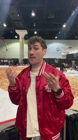 words largest pizza W full vid link in bio 