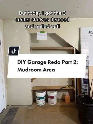 Mini mudroom zone out of a garage nook that housed some fairly useless shelving ✨ work in progress I just finished demo of the shelves today and WOW what a workout #garagemudroom #diygaragemudroom #diymudroom #diymudroommakeover 