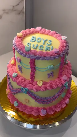 BOYS SUCK!!!! This is definitely a trust the process cake…. When I freestyle a cake I start out adding decoration and then keep building. As you can see, if I don’t like a detail I’ll take it off and add something else. What do you guys think of this Valentine’s Day Cake?  #ValentinesDay #valentinesday2020 #vdaycake #valentinescake #buttercream #buttercreamcake #QuakerPregrain #fyp #vintagecake #cakedecorating #cakedesign #weddingcake 