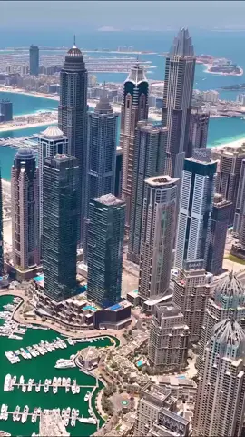 Skyscrapers at the Dubai Marina 🏙️🇦🇪 #dubai#dubaimarina#fy#fyp#viral#travel#worldwalkerz 