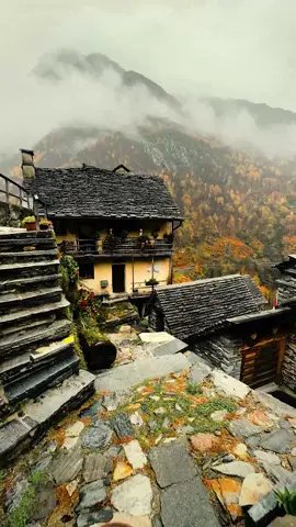 Would you stop off here for a typical swiss fondue 🫕 🇨🇭🧀? | 📍 Corippo / Switzerland (Ticino) | #switzerland #schweiz #village #ticino #autumn #rainyday #moody #nature #travel #europe #europetrip #travelideas #fyp 