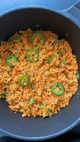Mexican Rice for burrito Part 2   This is our take on Mexican Rice for vegan burritos.  It's a great way to please both your taste senses and your need for healthful goodness. INGREDIENTS • 2 cups Long Grain Rice (washed and rinsed several times) • 1 cup Spanish Onion (diced) • 3- 4 cloves Garlic (chopped) • 2 tbsp Tex- Mex Seasoning • Salt and Black Pepper (for taste) • 1 1/2 cups Vegetable Stock • 1 cup Tomato Sauce • 1 tsp Dried Turmeric • 1/2 cup Jalapeno Pepper (sliced) • 1/2 cup Cilantro (roughly chopped) INSTRUCTIONS • Saute onion over medium-high heat in a large heavy skillet or pot until the onion is translucent • Add garlic and stir for a minute • Add rice, Tex-Mex, 1/2 tsp of salt, and 1/2 tsp of black pepper and cook for another minute • Add stock and tomato sauce. Stir and cover until the liquid has evaporated over a low heat • Add salt and black pepper if necessary • Add jalapeno peppers and chopped cilantro #burrito #mexicanrice #mexicanricerecipe #ricerecipe #veganburrito #quickeasydeliciousrecipes #fyp #FoodTok #foodtiktok 