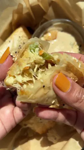 Baked crispy chicken rolls with cheese and veggies  Ingredients  16 oz Phyllo dough sheets ( 1 pack ) 2 lb boneless chicken breast  1/2 cup carrots (diced) 1/2 cup green bell pepper (diced) 1/2 cup mozzarella cheese (shredded) 1/2 cup mayonnaise or cream cheese  1/2 onion (diced) 2 tbsp soy sauce  Salt to taste 1 tbsp black pepper  3 tbsp oil Sesame seeds for garnish  Method : In a pot add chicken with 1 cup water soy sauce, salt and black pepper. Cook on medium heat. When the chicken is fully cooked and there’s no more water left, shred the chicken. In a bowl add the shredded chicken. Finely chopped veggies , mayonnaise and cheese. Mix well and taste. Add more salt or pepper if needed. Now take each filo pastry sheet, brush one half with the oil and water mixture then fold the otherwise on it. Place the filling on one end leaving some space on all sides then proceed to fold the spring rolls from the bottom on itself. When you get to the end, brush the last bit of the pastry on the edge with the oil and water mix and close it.Garnish with sesame seeds. Put your rolls on a baking tray with baking sheet and bake at 400 F for about 15 minutes until nice and golden. Serve immediately or refrigerate until ready to use. #springrolls️ #chickenroll #ramadanrecipes #LearnOnTikTok 