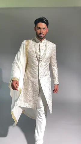 Regal and refined, this sherwani is the epitome of traditional elegance. Perfect for the modern groom who wants to embrace his roots.  #payalmalhotra #indianwedding #menswear #male #asiangroom #indianbride #hudabeauty #makeupartist #wedding #indianjewellery #asianbride #makeup #asianmenswear #asianwedding #asianbridalmakeup #bridal #india #bride #earrings #desifashion #fashion #necklace #bridaljewellery #londonmua #weddingjewellery #wakeupandmakeup #london #beauty #asianjewellery 