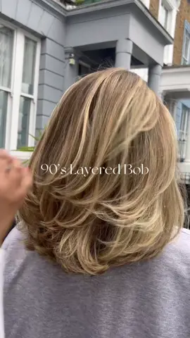 The 90s layered bob with a classic blowout , we are totally sold. Make sure you hit the link in our bio to book your next hair appointment. Colour by @rachelsyas | Cut and styled by @lovemeknot_ for @katie_budenberg in our Notting Hill salon.
