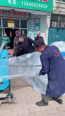 The first guy is measuring it before cutting