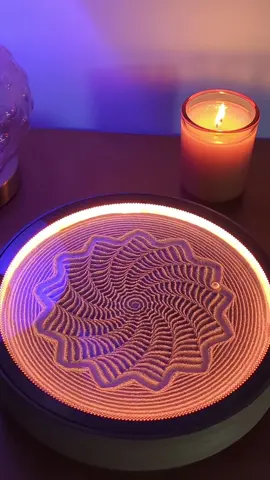 Have you ever wanted to lose yourself in a peaceful moment? Well, this kinetic art device is just for that! Watch as it draws calming patterns and pictures of goldfish in the sand. Feel the stress melt away as you relax and take in its soothing movements 🤎 #kineticart #relax #mindfulness #art #homedecor