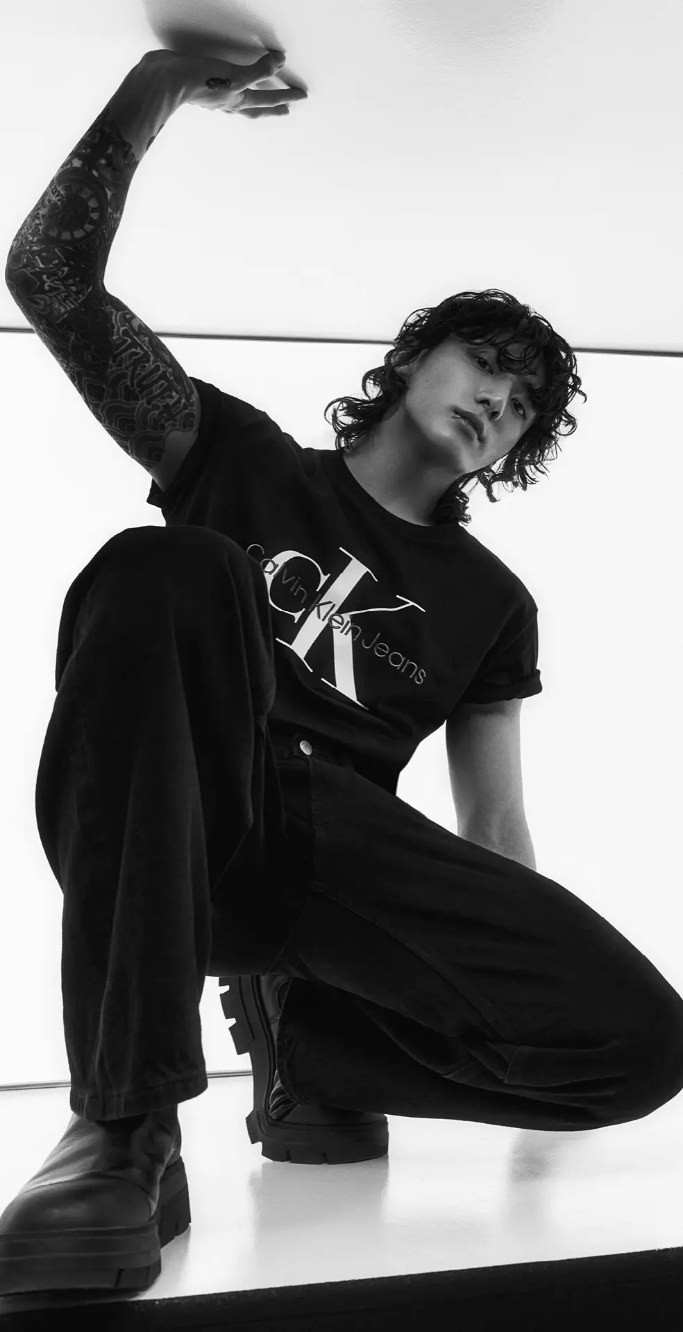 JK in CK. 🔥 #JungKook wears the Monologo Tee and Archive Logo Tee. #calvinklein