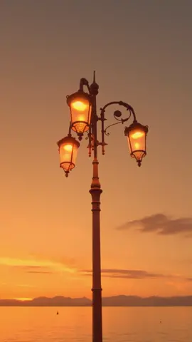 Garda lake.  Download this footage on Kmeel.com #stockfootage #gardalake #italy #sunset #light #beautiful #city #sunrise #nocopyrightvideo #downloadvideo #royaltyfreevideo 