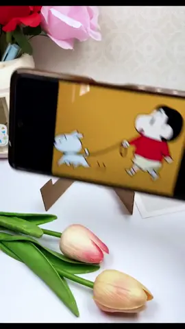 DIY a phone stand in a very simple way. #DIY #handmade #craft #art #foryou #fyp 
