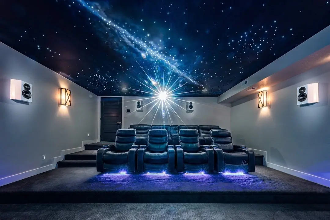 RIDGE THEATER • Client wanted a home theater where they could watch movies, game on their PlayStation, and even connect their laptop to the projector for work. They also wanted a custom star ceiling.  G E A R: projector: @sonyelectronics   processing/amp: Anthem AV  screen: Snap One  speakers: Revel  automation: Control4  ceiling mural: @bradslc  #hometheater #gaming #GamingSetup #hometheaterdesign #mancave #mancaveideas #homedesign #speakers #theaterseating #playstation #nintendoswitch #throwbackthursday #throwback #revel #revelconcerta #smarthomeinspiration #smarthome 