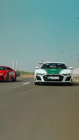 Meet the coolest police in the world 🫡🔥 #DubaiPolice  #lamborghini #tafheet #filmmaking #dubai #audir8 #تفحيط 