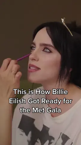 A #MetGala veteran, #billieeilish always brings the drama to fashion’s biggest night. Whether she is playing to her feminine or masculine sides, fashion fans can always look forward to the surprise of her looks. This year, rather than sleek or subtly finger-raked, the star’s tie-back braid was all about texture, the better to play up Eilish’s sheer and bedecked #SimoneRocha dress. Paired with a signature eyeliner look, the ensemble offered a new-gen nod to Karl.