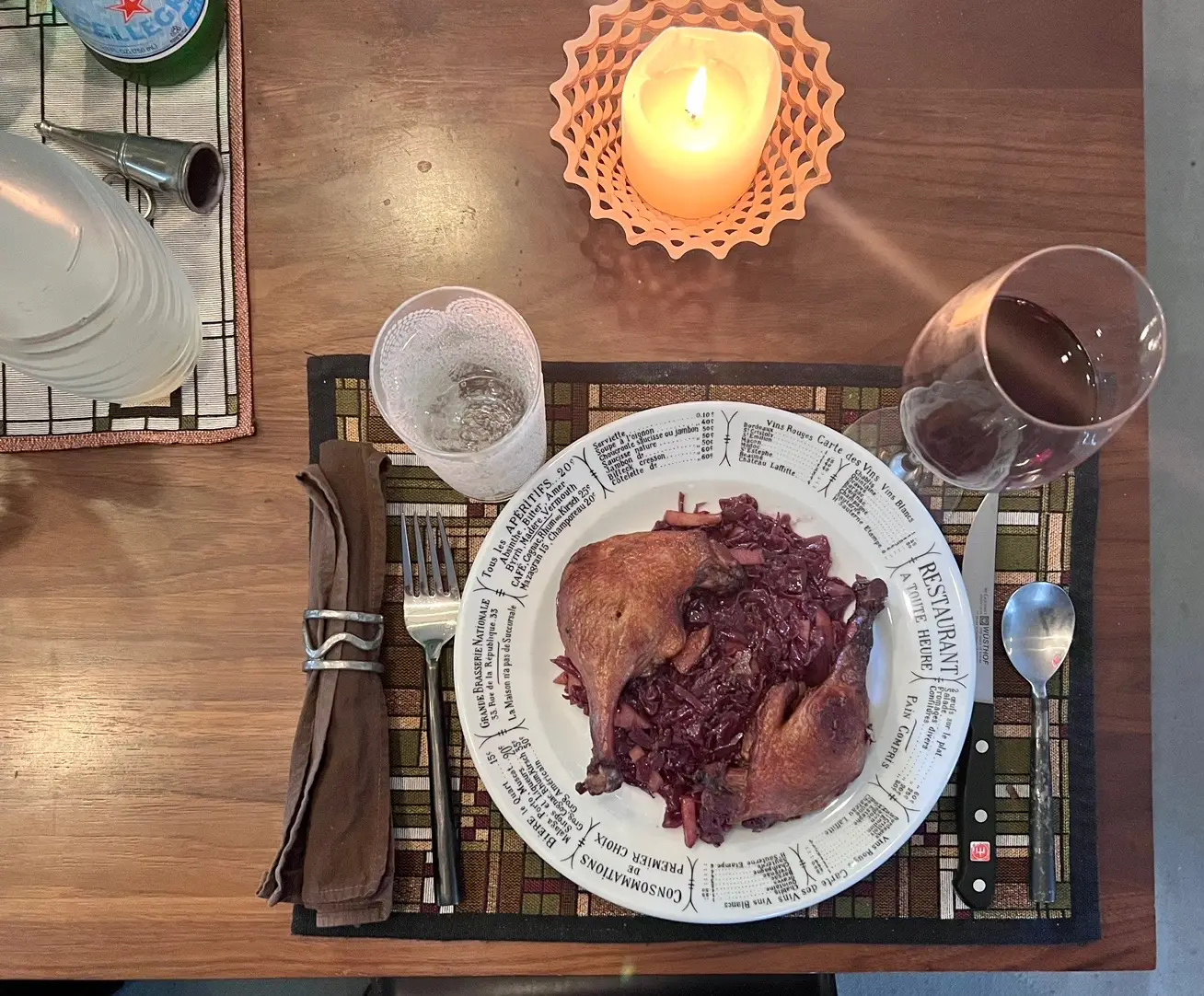 Braised duck legs, with home made red cabbage/apple/juniper berry/caraway.  Wine: Lagrein Alto Adige.  Sparkling water, 2 ways, alá Ty Music: Dionne Warwick. #dinner #flavelljames 