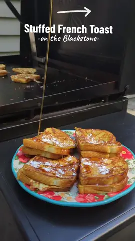 Stuffed French Toast on the Blackstone is the breakfast we all deserve!! Deeelish and such an easy recipe!! #Blackstone #blackstonegrill #blackstonegriddlecooking #blackstonegriddle #outdoorcooking #Recipe #breakfastideas 