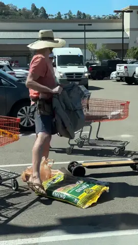 He carries it ALL on a skateboard 🛹🤯 #homedepot #skateboard #DIY #gardenproject 