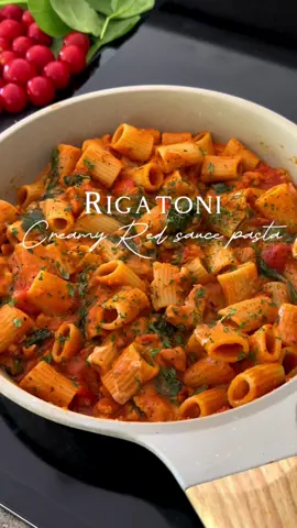 “Creamy, saucy, and utterly delicious: rigatoni pasta with a twist of red sauce.” Ingredients : . Cherry tomatoes 12-14 (cut into half)  . Spinach (hand full)  . 1 cup Tomatoes basil sauce  . 1 tbsp smoked paprika  . 1 tbsp black pepper (ground)  . 1 tbsp red chili flakes  . 1/2 tbsp salt  . 1/2 tbsp garlic powder  . 1/2 cup mozzarella cheese  . 2 tbsp feta cheese  . Rigatoni pasta (boiled) . 2 oz pasta water  . 3 tbsp butter  . 1/2 lbs chicken (diced) cut into small pieces, marinated with 1/2 tbsp black pepper , 1/2 tbsp paprika and salt to taste. Instructions: Add marinated chicken in a pan and cook it for 15 mints. Set a side. In the sauce pan, add butter, cherry tomatoes and all the spices. Add tomato basil sauce stir it for 1/2 minute.  Add spinach and chicken. Mix it together. Add pasta water mix well. The sauce will turned thick.  Add rigatoni pasta toss it.  Add mozzarella cheese. Add feta cheese. Mix well  Enjoy the Savor rich flavors of rigatoni coated in a luscious creamy red sauce. #pasta #pastatiktok #rigatonipasta #rigatoni #redsauce #redsaucepasta #explore #explorepage #foryou #foryoupage #fyp #fypシ #fypage #fypシ゚viral #homemade #italianfood #italianpasta 