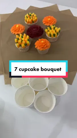 Watch me put together this 7 cupcake bouquet. These colours 🥰 Just Gorgeous! #cupcakebouquet #cupcake #bouquet #cakehowto #debbiebakes #cakestuff #caketok #watchme #learncake #buttercreamflowersvideo #orangeflower  #cupcakeflower #cakehowtovideo #cupcakebouquethowto #flowers #flowercupcakesbouquet 