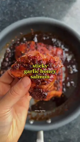 STICKY GARLIC SALMON - the best way to have your salmon. i used this for the sushi sandwiches i made the other week but it would be really good w rice, veg, noodles, pasta, anything 450g sockeye salmon side salt and pepper to taste 2 tbsp butter sauce 1/4 c tamari/ soy sauce 1 tbsp balsamic vinegar 2 tbsp honey 1 tbsp grated ginger 1/2 tsp chilli flakes 5 large cloves crushed garlic s+p to taste wash the salmon and pat dry. season with salt and pepper on both sides and set aside. mix together the sauce ingredients and set aside heat a pan on medium-high heat, add the butter. once melted, add the salmon and sear on both sides for 2-3 minutes or until browned.  add the sauce and lower heat to medium. and cook until sauce starts to thicken. flip and cook for another few minutes. serve and enjoy! #healthyfood #healthydinner #wellness #wildsalmon