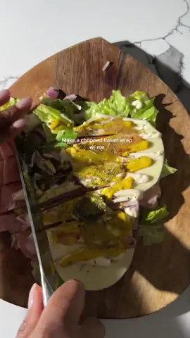 Would you try this chopped Italian wrap?  Chopped sandwiches are everywhere but I’m not into the thick bread sometimes so I put mine in a wrap & it was saying something!  Burrito sized wrap  Ice burg lettuce  Red onion  Salami  Ham  Pepperoni  Provolone  Banana peppers  Jalapeño  Mustard  Mayo Italian dressing  Italian seasoning  What would you out on yours?  #lunchideas #choppedsandwich #italianwrap #italiansandwich #choppeditaliansandwich 