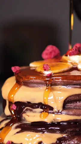Dripping and ready to eat  #banana #pancake #syrup #chocolate  Chocolate pancakes, layered with peanut butter and dark chocolate ganache. Topped with fresh banana and canadian maple syrup. The best way to start your day  #chef #pancake #chocolate #dessert #breakfast #yum #foodporn #artisanal #gourmet #pastrychef #desserts #maple #syrup #eat #stack #pancakestack