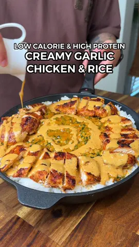 Healthy Low Calorie & High Protein Creamy Garlic Chicken & Rice! 🍗🍚 Ingredients:  600g Thinly Cut Chicken Breast 1 Tsp Olive Oil Smoked Paprika, Garlic Powder & Salt Sauce: 300ml Fat Free Evaporated Milk (Carnation Light & Creamy) 35g Freshly Grated Parmesan Cheese 1 Tsp Oregano, 1 Tsp Garlic Powder & 1/2 Tsp Black Pepper  10g Light Butter (Nuttelex Light) 4 Diced Garlic Cloves 150ml Chicken Stock 90g Light Cream Cheese 1 Tsp Smoked Paprika 2 Tsp Chicken Stock Powder (Vegeta - Low Sodium) Chopped Spinach #highproteinmeals #lowcalorie #weightloss #fatloss #Fitness #healthyrecipes #EasyRecipes #chickenrecipe 