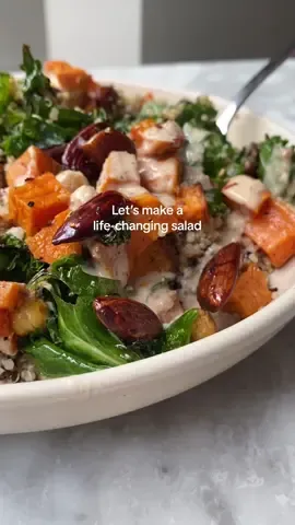 This salad may just change your life 💕 I know it’s a bold statement, but honestly it’s that good. The secret is in the fact that there are so many layers of flavour and texture, salad does not need to be soggy and sad. Plus it’s a 30-minute meal 🙌🌱 Ingredients (serves 4): - 1 large sweet potato, peeled & cut into small bite-sized chunks - 1 x 400g tin chickpeas, drained & rinsed - 100g quinoa - 100g almonds - 1 tablespoon of tamari - Handful of kale, roughly chopped - 1 tablespoon of almond butter - 2 tablespoons tahini - 1 lemon, juiced - 2 teaspoons maple syrup - Drizzle of olive oil - Pinch of sea salt & black pepper, to taste - Pinch dried red chilli flakes Method: 1.	Preheat oven to 180C (355F), fan setting. 2.	Place the sweet potato chunks and drained chickpeas into a large baking tray and add a drizzle of olive oil and a sprinkling of salt. Mix well and cook for 25-30 minutes until the sweet potatoes are soft and beginning to turn golden at the edges. 3.	While the sweet potato cooks, place the quinoa into a saucepan with 200ml of water and a pinch of salt. Cover, place over a medium heat and bring to a gentle simmer. Allow to cook for 10-12 minutes until the water has been absorbed, then turn off the heat and leave it to steam in the residual heat. 4.	Place a large pan over a medium heat and add a drizzle of olive oil and 1 tablespoon of tamari. Once warm, add the almonds and mix well. Cook for 3-4 minutes until the tamari thickens and coats all of the nuts. Add the kale and cook for 2-3 minutes until tender and reduced. 5.	To make the dressing, place the almond butter, tahini, lemon juice, maple syrup and 2 tablespoons of water into a small bowl. Whisk until combined, and adjust seasoning to taste. 6.	Arrange some quinoa, cooked sweet potatoes and chickpeas, kale and almonds in serving bowls and drizzle with dressing. Sprinkle with red chilli flakes, if desired. #deliciouslyella #plantbased #plantbasedrecipes #healthyrecipes #healthymealinspo 