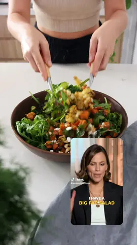 Jennifer Garner’s Salad  Follow @_plantbaes_ for more easy, healthy recipes 🌱 All recipes at plantbaes dot com Jennifer Garner recently went on Women’s Health and described the big fat salad she has every day for lunch, so we had to give it a go!  When she mentioned a hearty veggie, I instantly thought of cauliflower, and because the oven was already on for the sweet potatoes decided to roast it.  Then she said put anything in there; it’s big, it’s hearty so I added some lentils because if you’ve been here for a minute, you know we won’t have a salad without a good source of plant protein in there and also added some fresh dill which really made the whole salad pop.  As Jennifer did not mention the dressing, I decided to make my absolute go-to dressing with balsamic vinegar and Dijon mustard, it goes with everything and is so easy to make.  So what do you think? Will you give this salad a go? For me, it’s a big yes, I was in the moment I heard ‘big salad’ 😍 Serves 2  Ingredients: - 2 cups diced sweet potatoes - 2 tsp olive oil - 1.5 cups diced cauliflower - 1 cup diced broccoli - 1 cup green bean ends removed, chopped in half - 3 cups arugula (rocket) - 1 tbsp chopped cashews - 1 tbsp chopped pistachios - 30g plant-based feta - 1 cup cooked beluga lentils - 1/4 cup dill Dressing:  - 1 tbsp Dijon mustard - 1 tsp olive oil - 2 tsp balsamic vinegar - 1/2 lemon juiced (1.5 tbsp)   Instructions: 1. Preheat the oven to 390F (200C). Combine the sweet potatoes with 1 tsp olive oil, salt & pepper. Bake for 35 minutes.  2. Combine the cauliflower with 1 tsp olive oil, salt & pepper. Bake for 25 minutes  3. Boil the broccoli and green beans for 2 minutes. Then place in cold water until cool down and drain.  4. Whisk the dressing ingredients together.  5. To a large bowl combine the broccoli, green beans, sweet potato, cauliflower, arugula, cashews, pistachios, feta, lentils, dill, and the dressing. Adjust salt & pepper to taste. Enjoy!  #jennifergarner #jennifergarnersalad #salad #EasyRecipes #healthyrecipes 