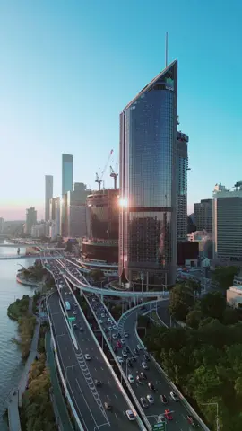CBUS Super Office Tower in Brisbane. Who hasnt dreamt of sliding down the top of it?  🌅✨ #fyp #fypシ #brisbane #brisbane_australia #brisbanecity #cbus #tower #building #sunset #drone #dronevideo #droneshot #dronetiktok 