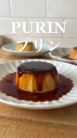 I saw the Purin video from @wolf.0313  inspired me to make one 🍮 Purin is very similar to flan or creme caramel. There is dark caramel sauce on the bottom, and it balances out well with the sweet custard. It is a staple and classic dessert found in Kissaten, a Japanese coffee house.     Ingredients  For Burnt Caramel  60g sugar 2 teaspoons water  For Custard 2 eggs, room temp 60g sugar 200ml milk 100ml heavy cream 1 teaspoon vanilla extract