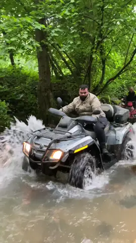 Can-am outlander 800 is pulling the arctic cat 700 in the water for cooling #canam #outlander #outlander800 #offroad #atv #bombardier #outlander850 #mud #arcticcat 