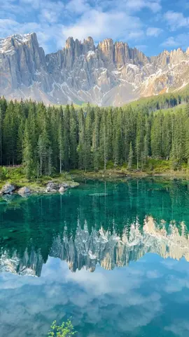 A different side of Italy - Karersee (Lago di Carezza) We had this stunning lake all to ourselves  #italy #dolomites #travel 