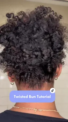 Y2K Twisted Bun Hairstyle 🫶🏽 I was eager to try something different rather than rocking my regular bun or poof… what do you think? 👀 #hairstyletutorial #y2khairstyle #y2k  #curlyhairstyles #curlyhairtutorial 