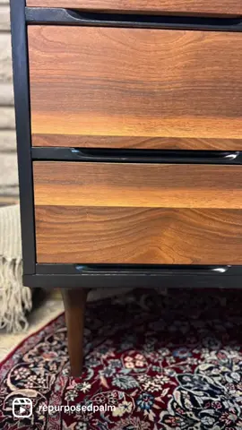 This MCM style 4 drawer dresser got a Sleek Makeover.  I think the black really highlights the beautiful wood drawers and top.  Steps and Products used:  I cleaned the entire piece with  Dawn dish soap, and TSP solution. Rinsed it off with water till no residue remained.  Carbide scraper was used to remove the old finish off the top and drawer fronts. Sanded the entire piece with 220 grit sand paper.  Body was painted with Behr premium paint in the color, carbon.  Sanded in between coats of paint with 400 grit sandpaper.  entire piece was sealed with 2 coats of Minwax polycrylic in a semi gloss sheen. #furnituremakeover #flippingfurniture #mcm #mcmpaintedfurniture #paintedmcmfurniture  #beforeandafterfurnituremakeovers  #beforeandafterfurniture #DIY #dresser  #furniture  #recycle  #Sustainability  #repurpose  #behr #minwaxpolycrylic 