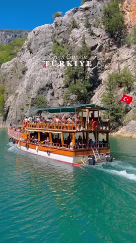 ✅Follow my instagram @travel_withben 📍Green Canyon, Manavgat, Antalya, Türkiye 🇹🇷  ✨Close to Manavgat, in the heart of the Taurus Mountains, Green Canyon is a popular destination for summer excursions in the Antalya region. You can walk along the shore and admire the beauty of nature. There are several cafes and restaurants on the shore, offering Turkish specialties with a beautiful view. But the best way to see the canyon up close is on a 17-kilometer boat tour. The cruise takes you along a rugged rocky landscape to the Olymapınar Dam. During the cruise there are various stops, where you can jump into the crystal clear water, swim in the emerald green lake, and cool off. ⭐️ Food and drinks are also included during the boat trips.  💰 €30 per person - this includes transfer to & from hotel.  📸 Photographer on the boat, so bring cash if you want professional pictures.   #türkiye #antalya #travel #nature #naturelovers #traveltiktok 