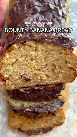 RECIPE BELOW 👇🏽  🥥 BOUNTY BANANA BREAD 🥥  This bounty banana bread is is soft, moist, and has a delightful tropical coconut flavour. You only need a few ingredients and one bowl!  What other flavours of banana bread would you like me to create? Love, DB x INGREDIENTS  ▪️3 large very ripe bananas, mashed ▪️1/4 cup maple syrup or any sweetener  ▪️1/3 cup coconut oil, melted ▪️1 1/2 cups self raising flour ▪️3/4 cup desiccated coconut  Topping  ▪️100g dark chocolate  ▪️1/2 cup coconut flakes (or more desiccated coconut) METHOD  ▪️Preheat oven to 180c ▪️In a large bowl, mix all the ingredients (apart from toppings) together  ▪️In a prepared loaf tin, pour the batter in. ▪️Bake for 45-55 minutes or until toothpick comes out clean  ▪️Once your loaf has cooled, melt the chocolate and mix in coconut flakes. Pour on top of loaf and let it set in fridge for 30-60 minutes, and then ENJOY!  #bananabread #coconutbananabread #coconutloaf #bounty #healthyrecipes #EasyRecipes 