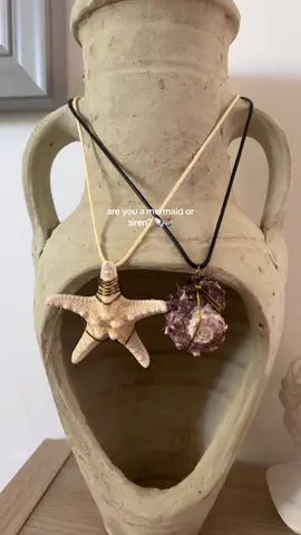 are you a mermaid or siren? Link in bio to order which necklace you are 🐚🧜🏼‍♀️ #sirencore #sirencorejewelry #mermaidcore #mermaidjewelry #sirenjewelry #mermaidaesthetic #sirenaesthetic #handmadejewelry #smalljewelrybusiness #seashelljewelry 