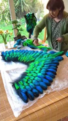 The Dragon Winged Cape. Amazing felt work 🙌 Repost from the talented @karenraofelt 🤩👏 Wet Felting the feathered cape using beautiful blends of merino wool in blues to greens. Worn as evening attire to a larping accessory.  dm @karenraofelt for details.  #wings #birdwings #dragoncostume serpent #dragoncosplay #dragonball #gothic #felting #wetfelt #wetfelting #wetfeltongwool #felterofinstagram #viking #celtic #dressingup #wasteland #larp #larping #larpcostume #feltedcape #feltedshawl #feltedcollar #wetfelted #woolfelted #karenrao #karenraofelt #revolutionfibers 
